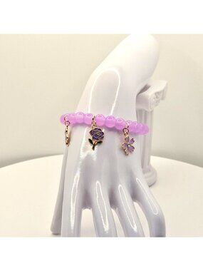 Purple Beaded Stretch Bracelet With Flower Charms Gold Tone Accents